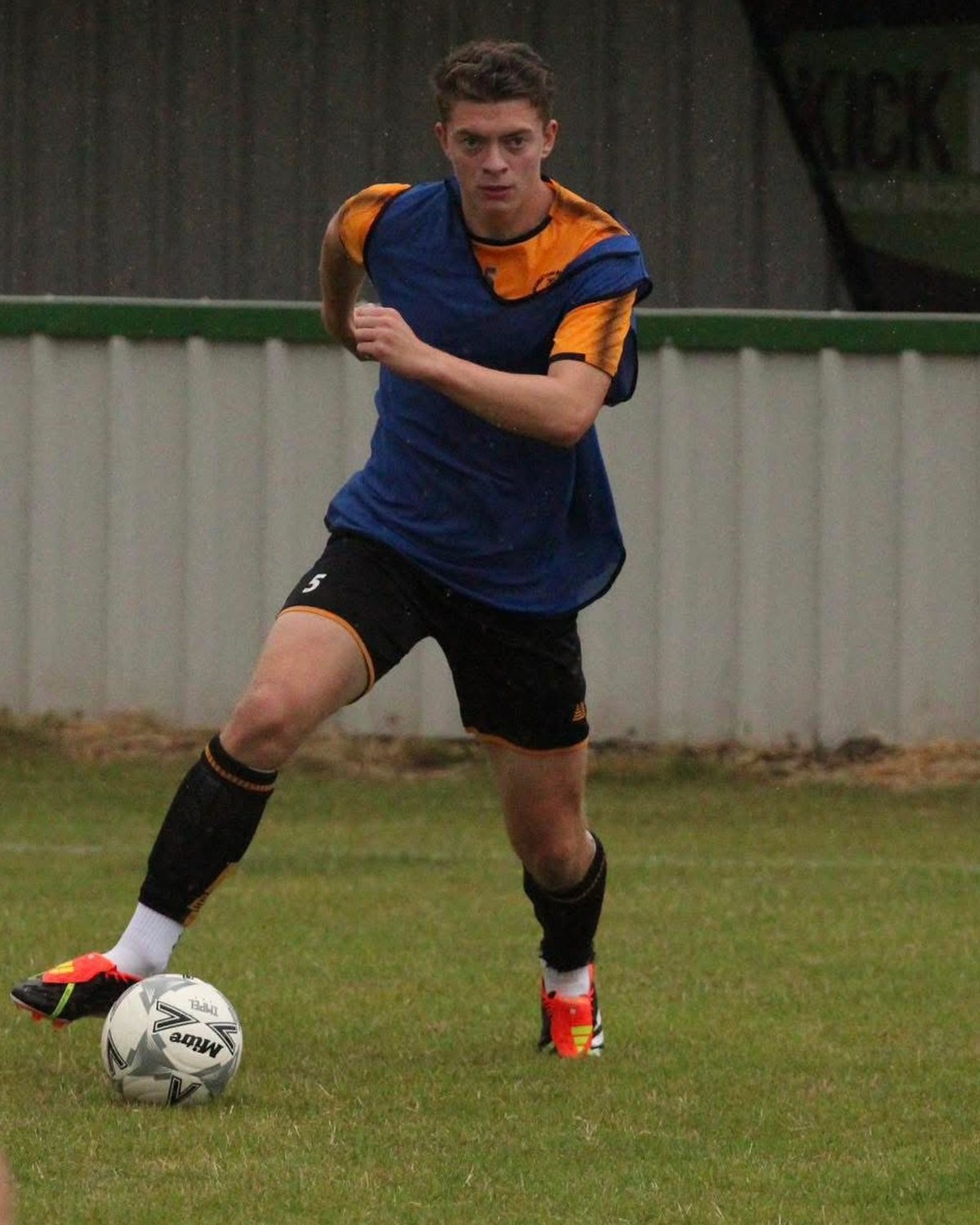 Joe Eason driving forward with the ball in training