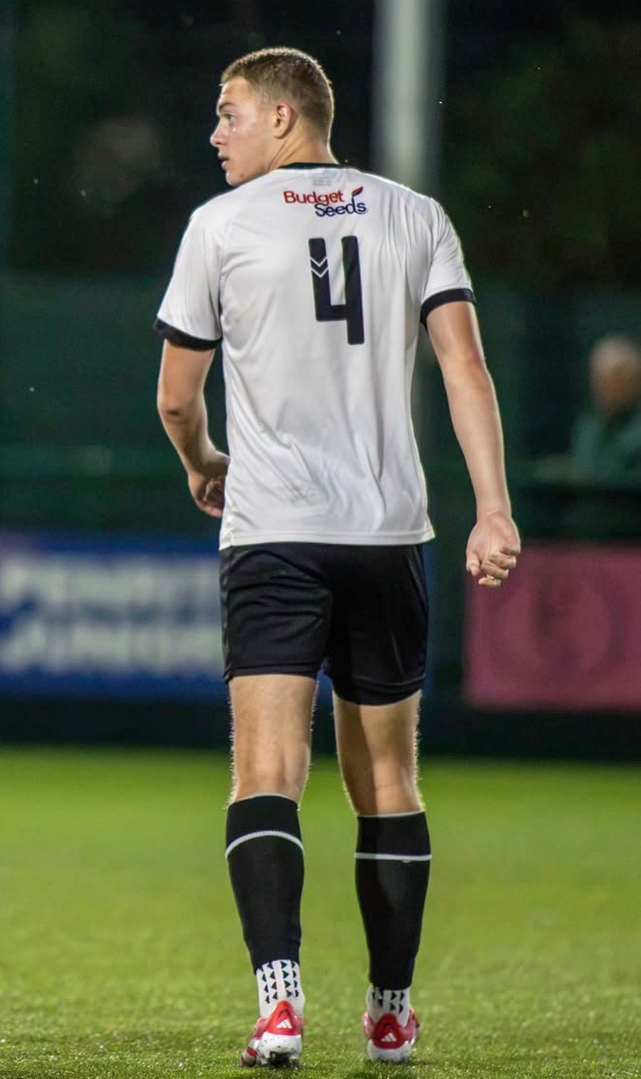 Joe Eason wearing number 4 for Ashington AFC in a senior match