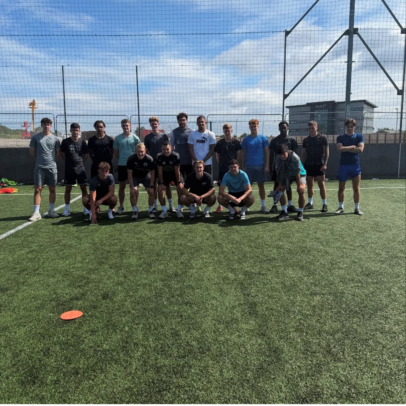 Joe Eason with the senior training group, including professional footballers